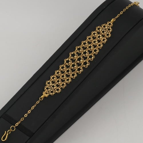 طقم ذهب بتصميم ورود - عيار 21