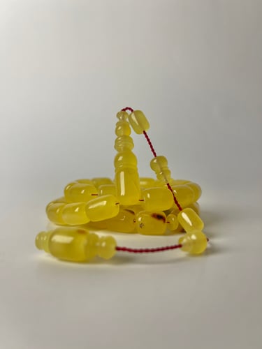 مسباح كهرمان طبيعي حجر واحد