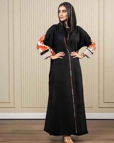 عباية كريب اسود مع أورنج