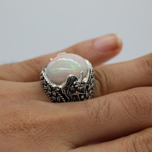 خاتم رجالي اوبال اثيوبي موديل عازفة الكمان