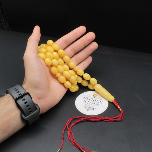 Natural amber rosary, cut egg-shaped, 57 beads