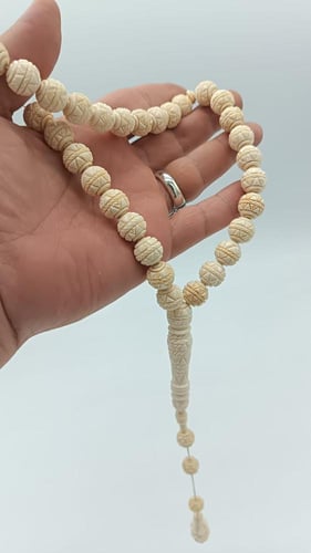 سبحة عاج مطعم فضة 33 خرزة