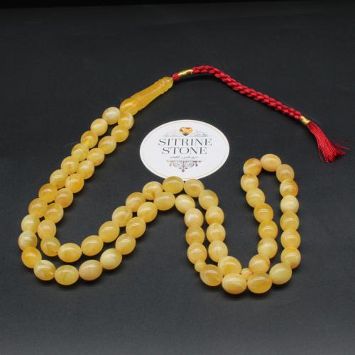 Natural amber rosary, oval-shaped, 64 beads
