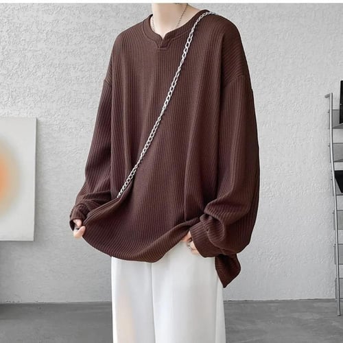 تي شيرت واسع بأكمام طويلة