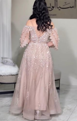 فستان سهره فخم حسب طلبك شك يدوي تل