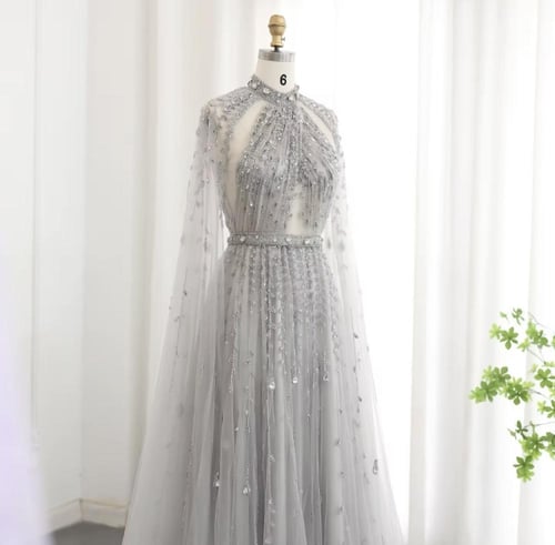 فستان تل مطرز برقبه وظهر مفتوح