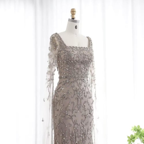 فستان فخم تطريز كامل واكمام كيب