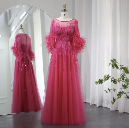 فستان تل تطريز مزين بالريش على الأكمام