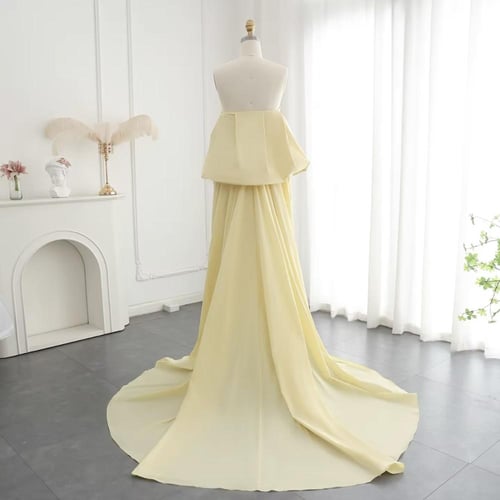 فستان راقي تطريز كامل بقطعة خلفية طويلة