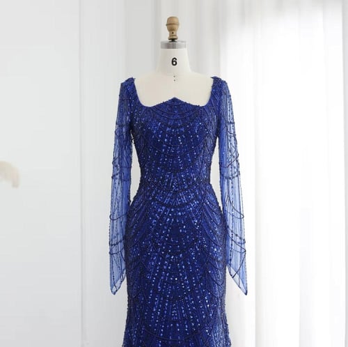 فستان ماسك بتطريز كامل وأكمام شفافه