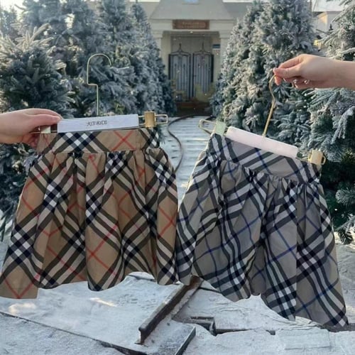 تنورة كلاسيكيه قصيره بنقشة كاروهات