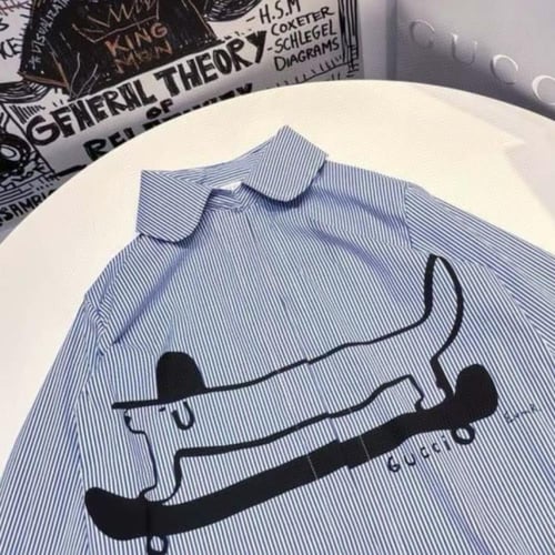 قميص قطني مخطط ازرق بطبعه كرتونيه