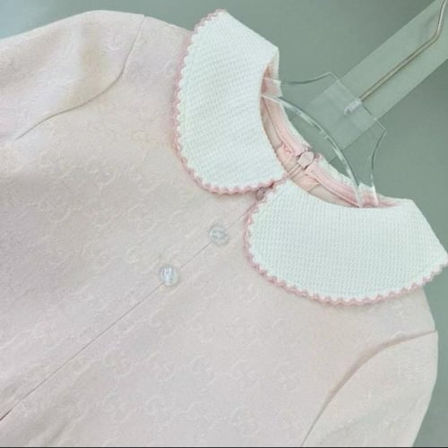 فستان كانڤاس وردي باكمام طويله من قوتشي