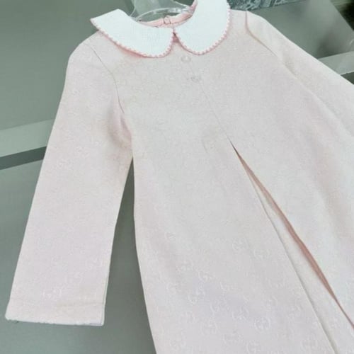 فستان كانڤاس وردي باكمام طويله من قوتشي