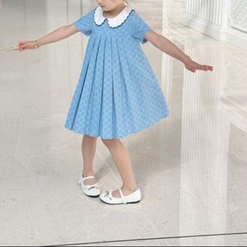 فستان قطن باللون السماوي بشعار قوتشي