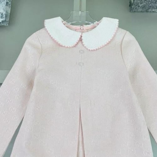 فستان كانڤاس وردي باكمام طويله من قوتشي