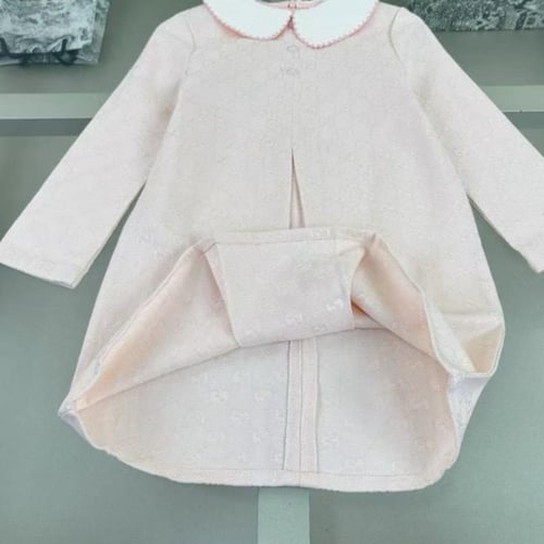 فستان كانڤاس وردي باكمام طويله من قوتشي