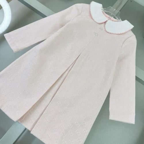 فستان كانڤاس وردي باكمام طويله من قوتشي