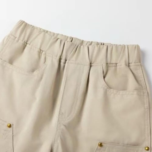 شورت بيج عليه شعار الماركة للأولاد