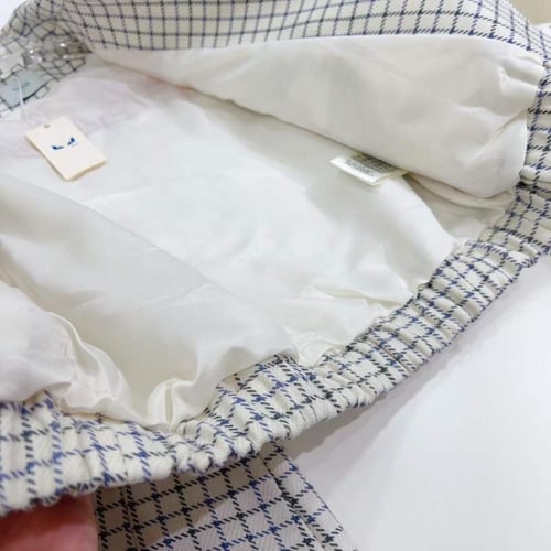 جاكيت بسحاب امامي ونقشة مربعات