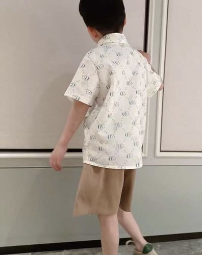 قميص قوتشي اولاد ابيض