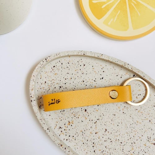 ميدالية جلد بالاسم