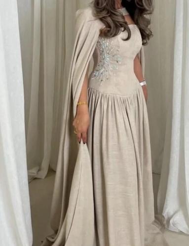 فستان لينين طويل أنيق بلون كريمي هادئ