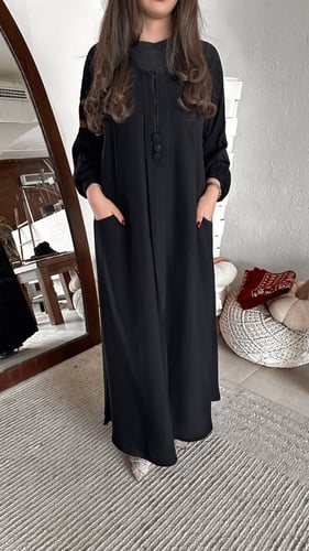عباية كم قبضة بجيوب أمامية