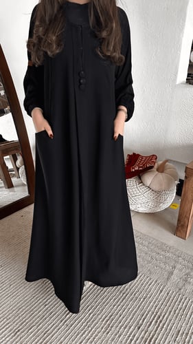 عباية كم قبضة بجيوب أمامية