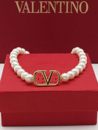 طقم فالنتينو ذهبي شامل الملحقات