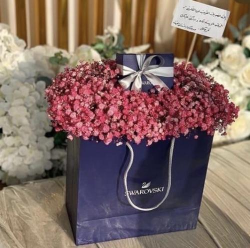 ورد جيبسوفليا مع سلسال سواركسكي(السعر غير شامل اله...