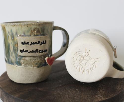كوب بعبارة ( قالو العمر ساره)