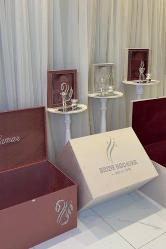 The bride's package includes the incense burner, the ring box, and the dress box.
