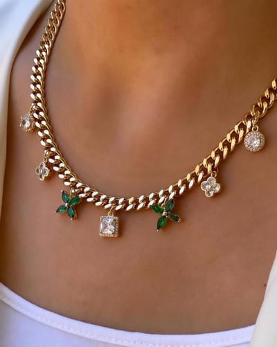 سلسال ذهبي بتعليقات زهرية أنيقة مطلي ذهب . MN-147