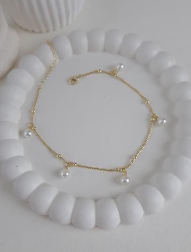 خلخال مطلي ذهب مزين بحبات لولو لون ذهبي. MA-009