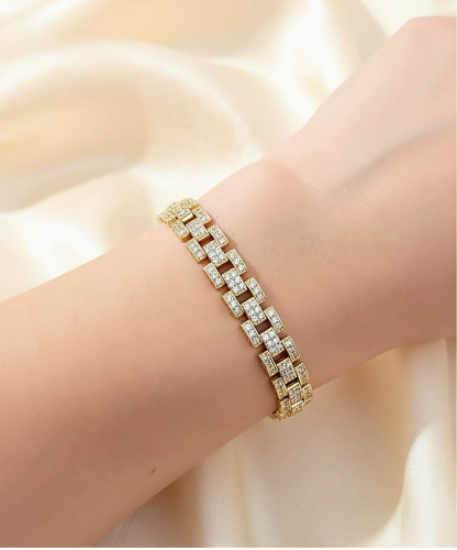 ساور مستوحى من ماركة رولكس مطلية ذهب ومغطاة بالزري...