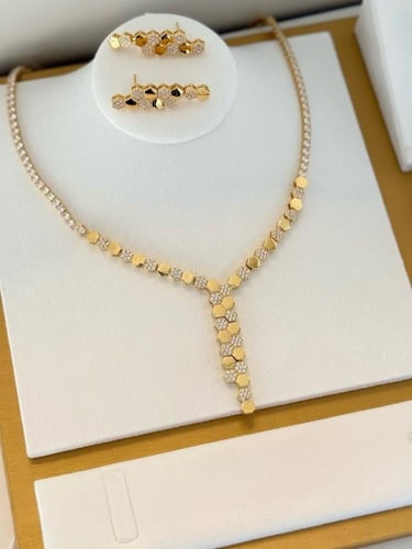 طقم شوميه تنس مؤلف من قطعتين مطلي ذهب . MS-063