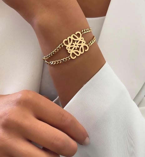 سوار مستوحى من Loewe مغطى بالزركون من جهة قابل للا...