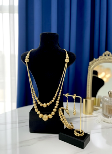 طقم دوريكا من سلسال مزدوج قصير مع حلق وسوار وخاتم...