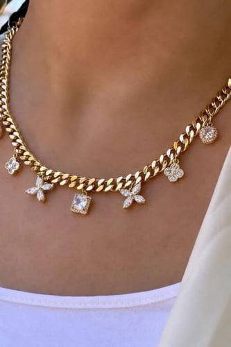 سلسال ذهبي بتعليقات زهرية أنيقة مطلي ذهب . MN-147