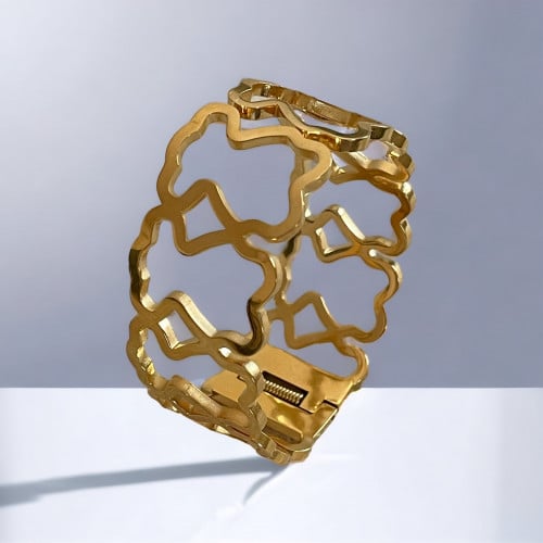 سوار تيتانيوم صلب عريضة ومفرغة لون ذهبي. MB-005