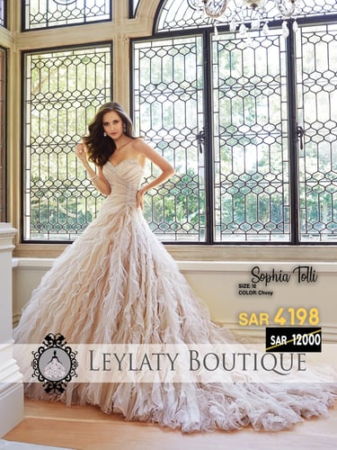 فستان زفاف رائع ومذهل من مصممة الأزياء Sophia Toll...