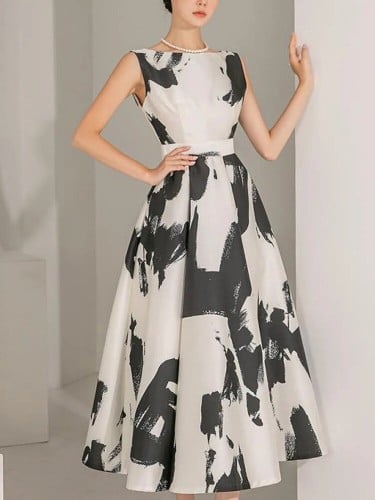 فستان نسائي صيفي بتصميم أنيق للنساء بدون أكمام و م...