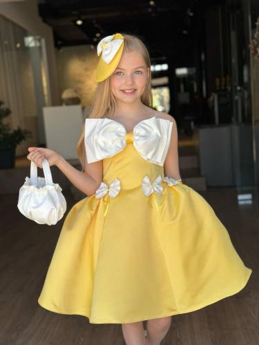 فستان الفيونكه مع شنطه واكسسوار شعر