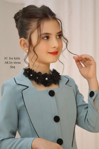 فستان رسمي بتصميم مميز مع شنطه