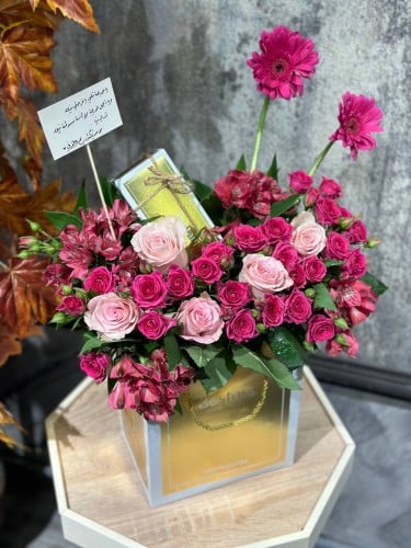 شوكولاته بستاني منسقة على الكيس بتشكيلة ورود منوعة...