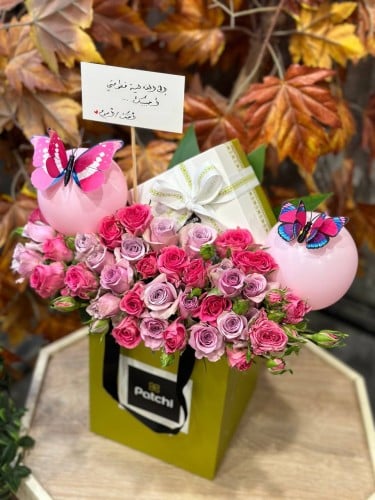 شوكولاته باتشي منسقة على الكيس بورد بيبي روز طبيعي...