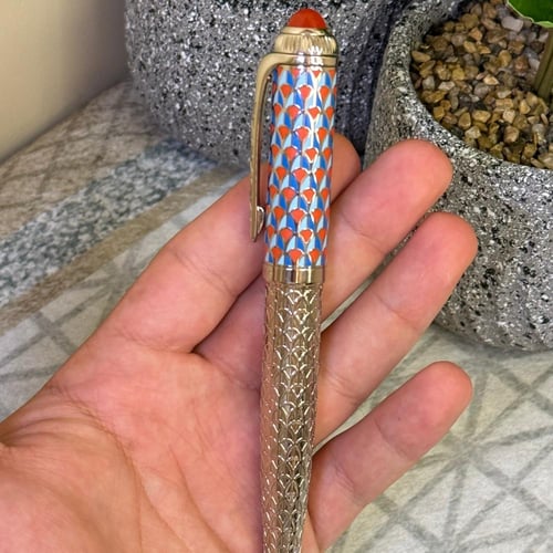 قلم سري برتقالي