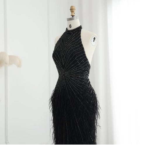 فستان سهرة فاخر ريش مع تطريز يدوي من سمارا بوتيك-E...