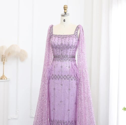 فستان سهرة راقي ميدي تطريز يدوي ريش من سمارا بوتيك...